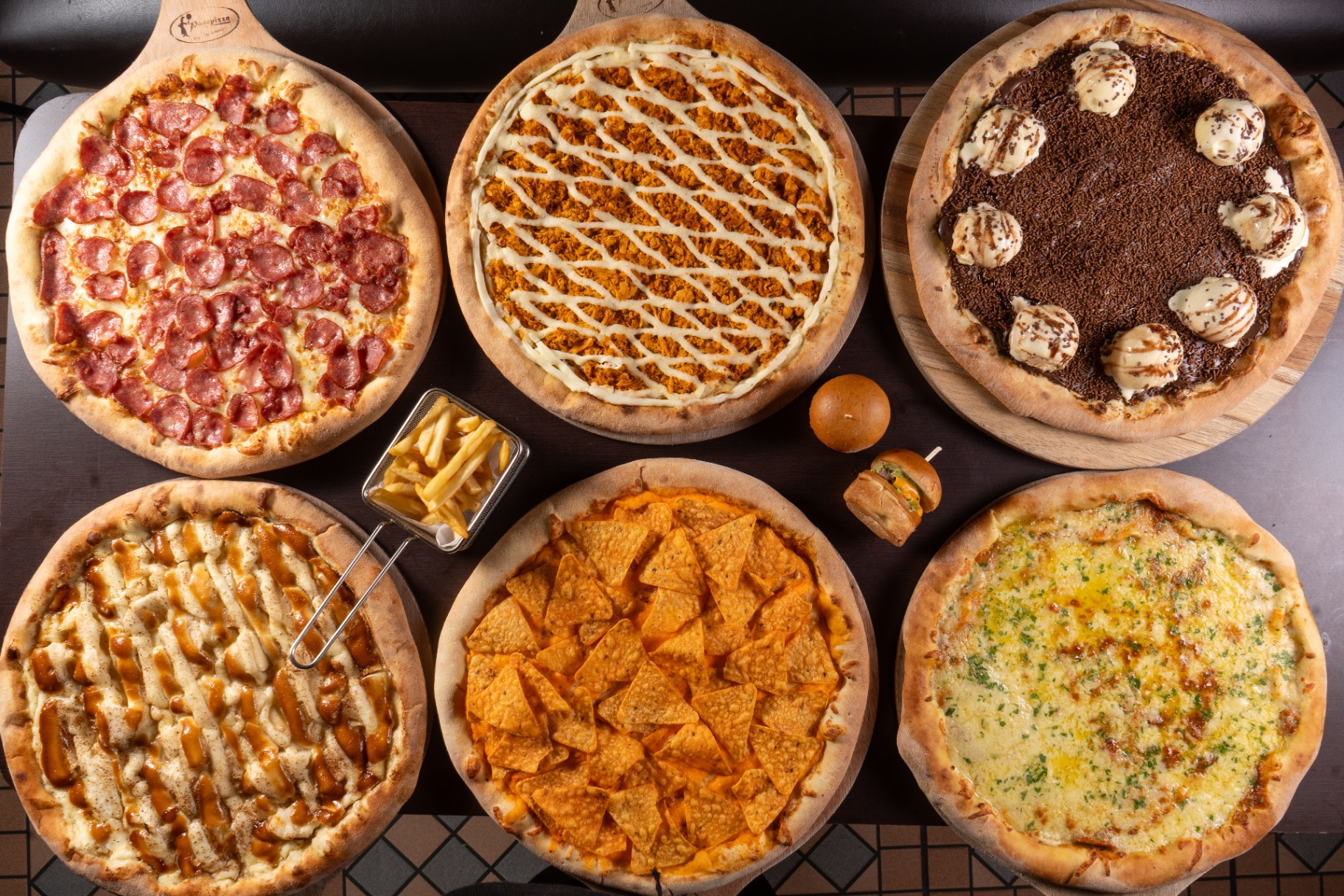 Variedade de pizzas Fogaça's